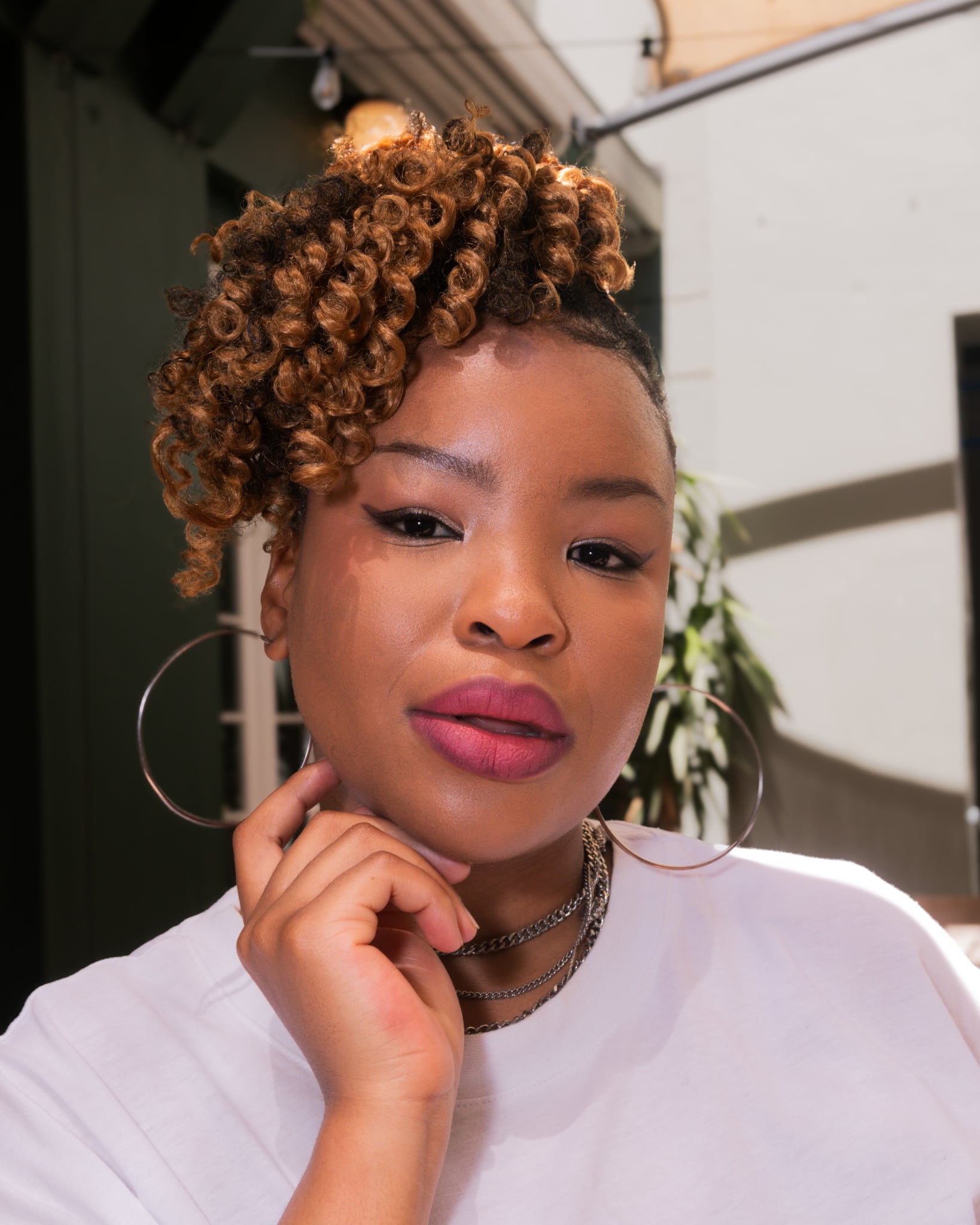 East London-born musician Khitha Pinca is making waves in the South African music industry, blending hip-hop and trap influences with a distinct artistic flair.