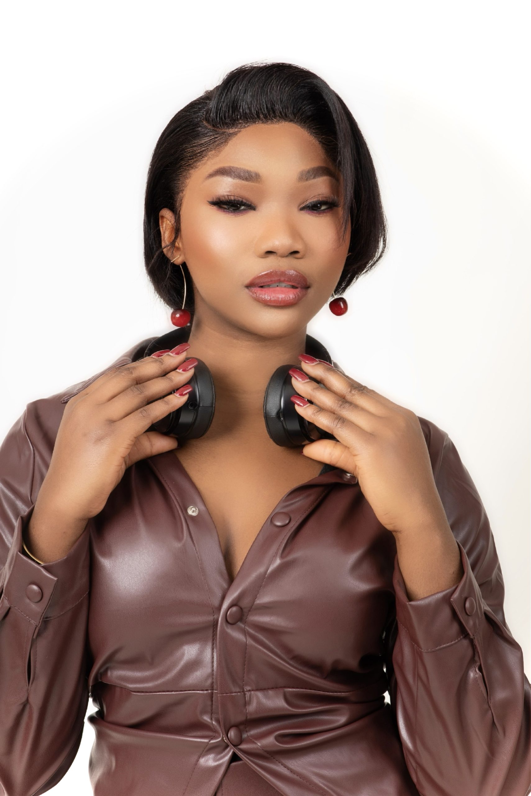 DJ Divar, born Okunlola Omowumi, is a rising force in  entertainment industry, blending Afrobeats, Amapiano, Hip Hop, and R&B.